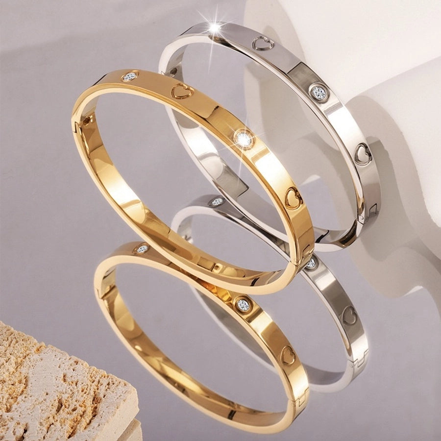 Heart & Clover Bangle Collection